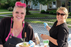 two woman smiling