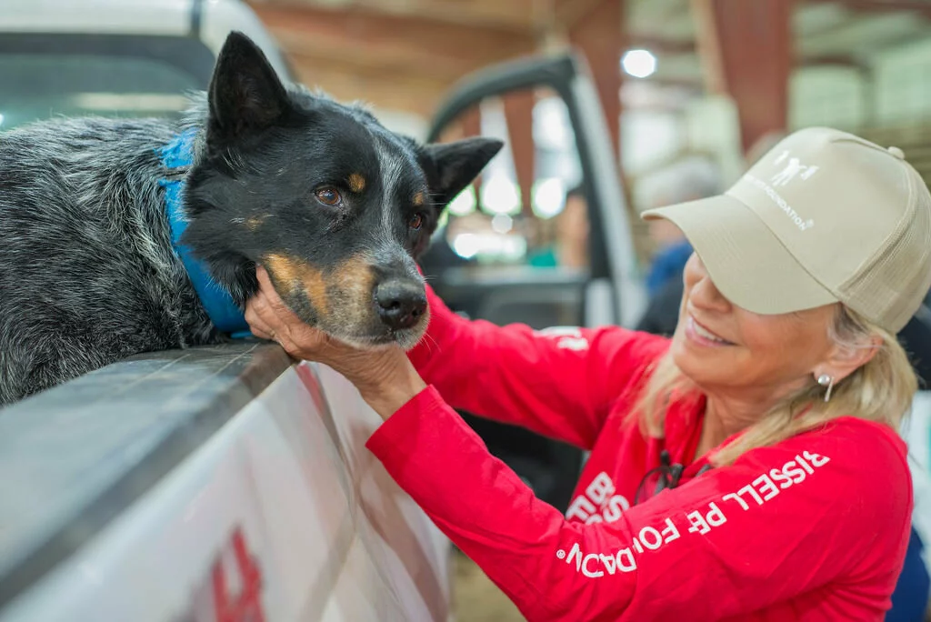 Cathy and dog in truck