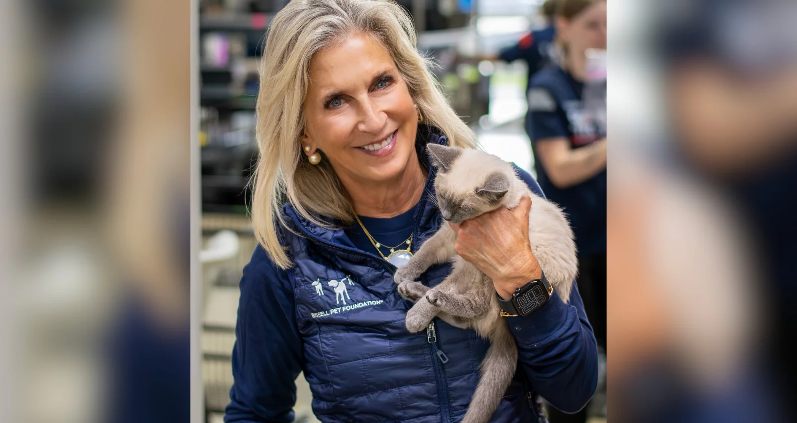 Cathy Bissell with a kitten.